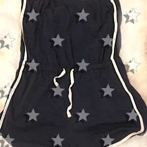 Lightly used soft blue romper with white trim